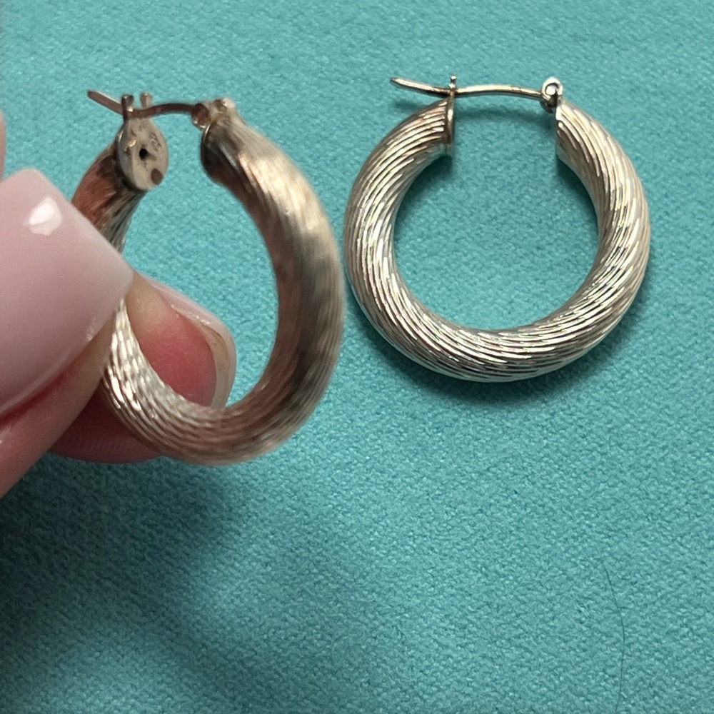 .925 sterling silver hoop earrings.